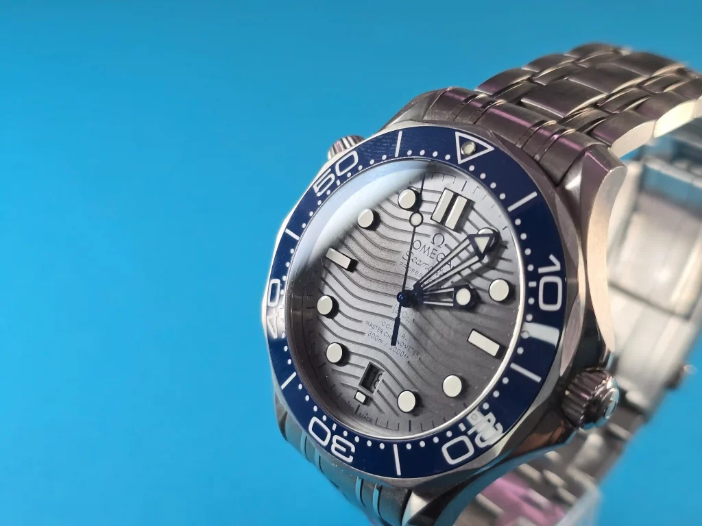 Close up of Omega Seamaster gray dial 
