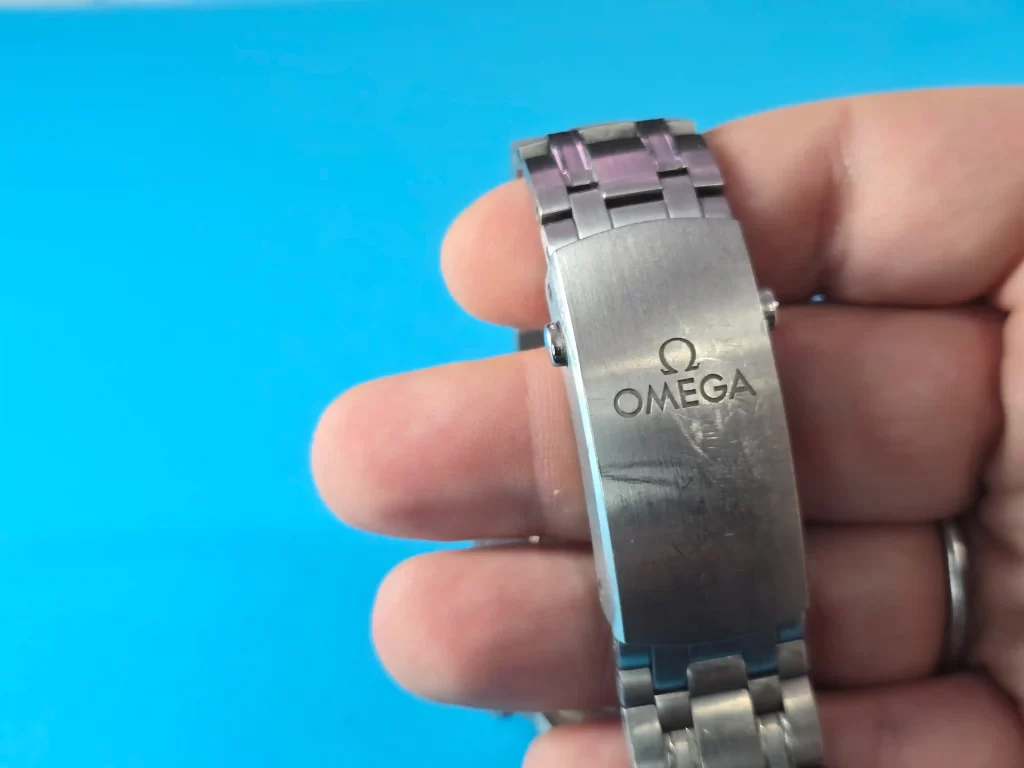 Buckle with scratches of Omega Seamaster 