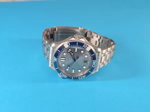 Omega Seamaster on sky blue background. 