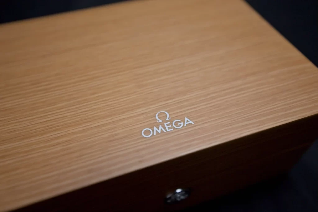 top of the Omega box with logo