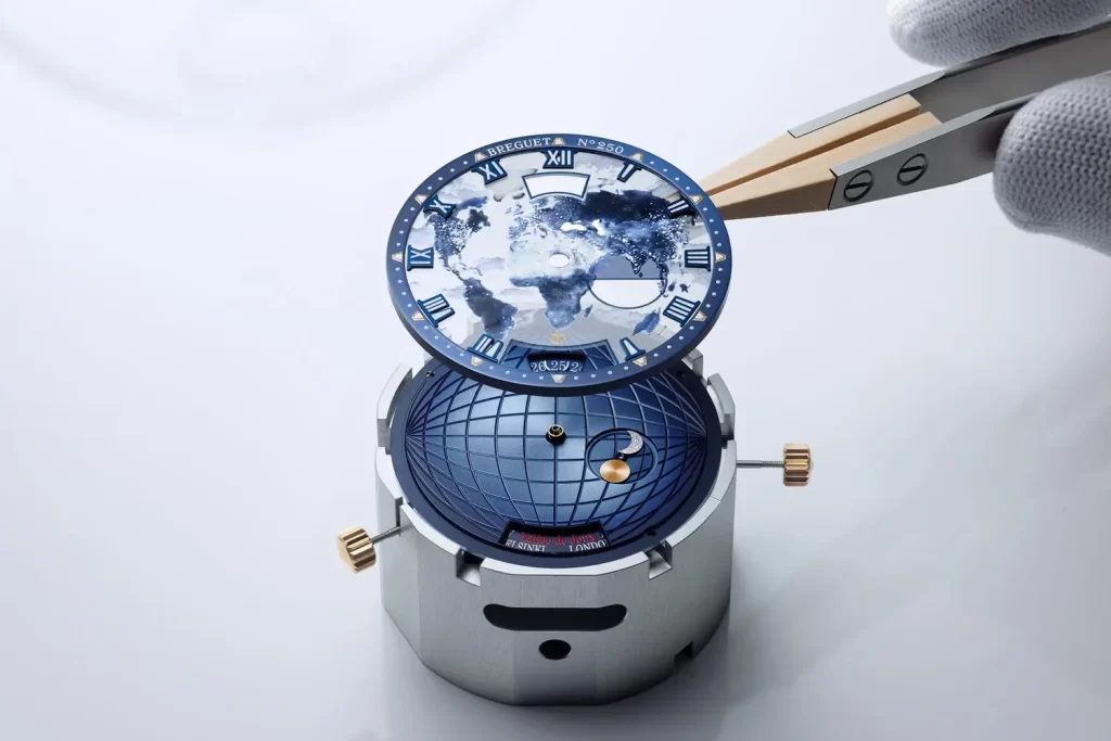 Applying the second layer of dial made from sapphire crystal